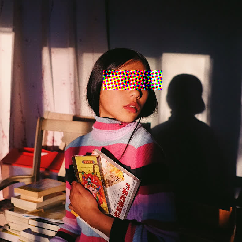 a colour photograph of Anova Hou, originally cropped from an art piece. She is seated holding some books but an agressive halftone pattern obscures her eyes